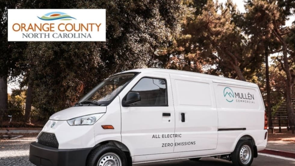 White delivery van against a wooded background, and inset logo for Orange County, NC.