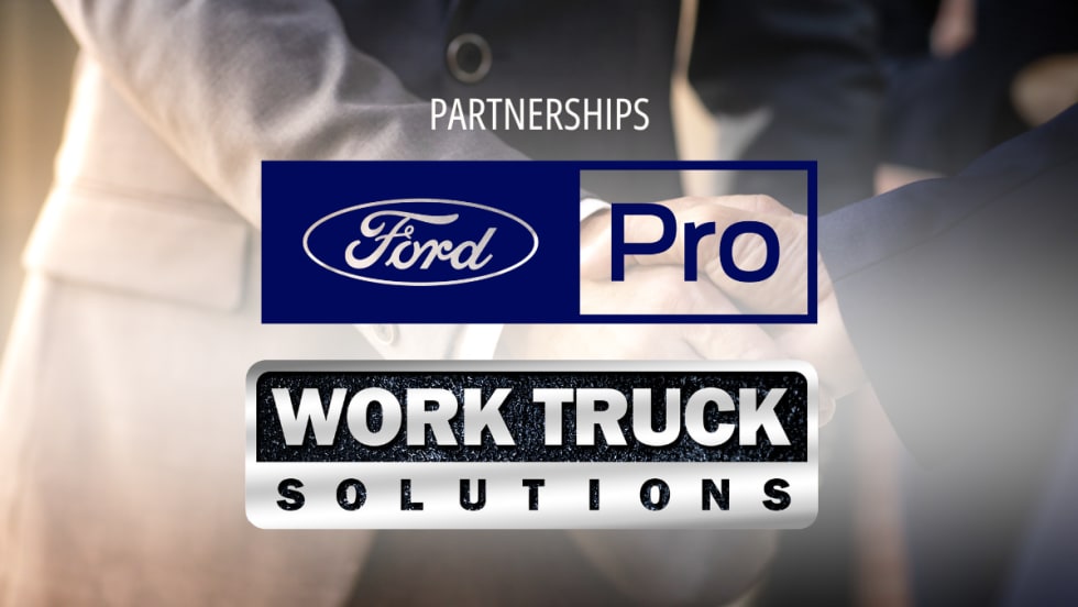 Logos for Ford Pro and Work Truck Solutions against a background image of a handshake.