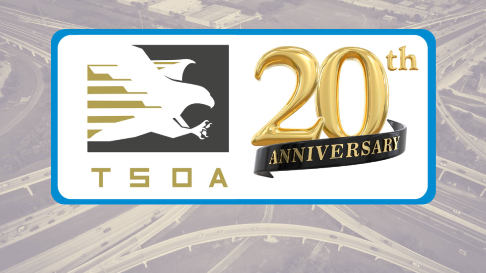 Tinted background image of a highway interchange with white box in front containing logo for TSOA and a graphic for 2oth anniversary.