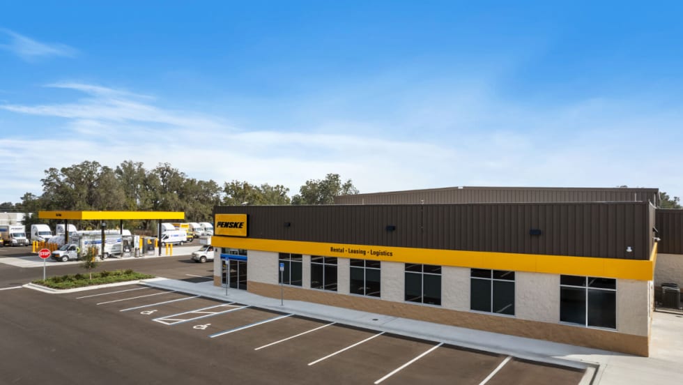Photo of the front of a Penske Truck Leasing facility.