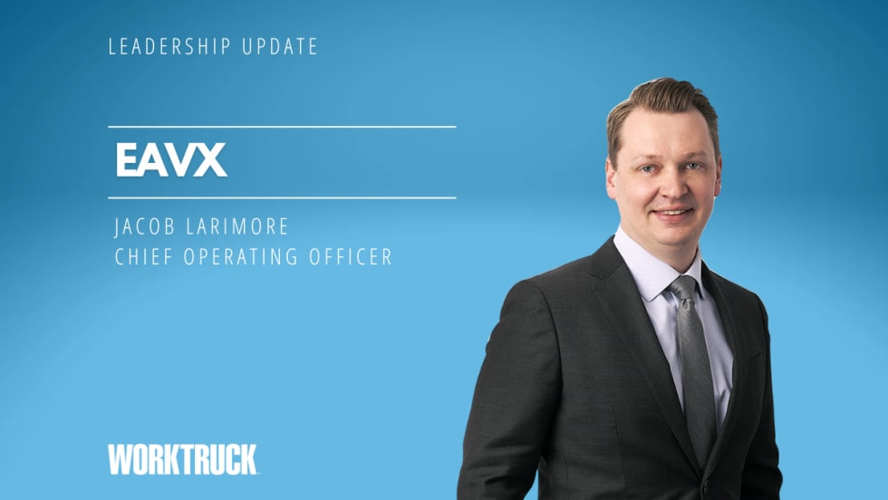 Man in business attire against a white background with company name, EAVX, in white headline and man's name and title also in white.