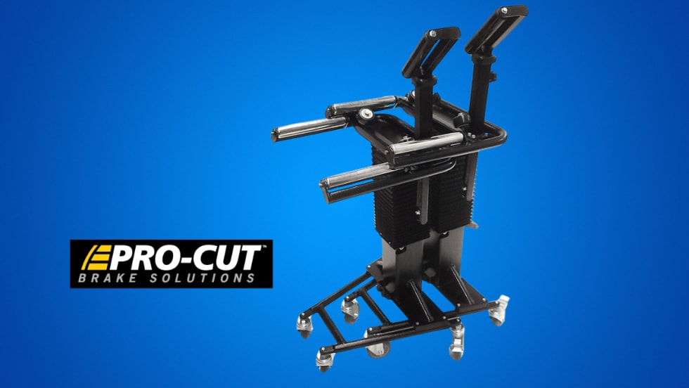 Tire trolly against a blue background with logo for Pro-Cut.