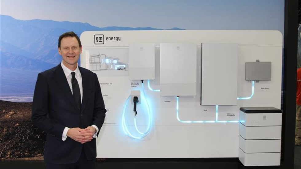 Duncan Alrdred in front of a display of GM Energy products