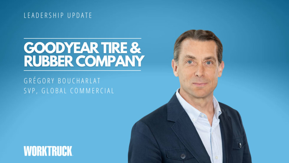 Man in business attire against a blue background, white text says 
Goodyear Tire & Rubber Company and the man's name.