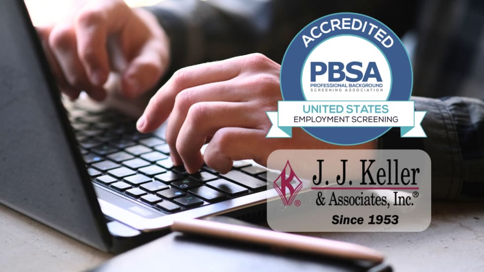 Closeup of man's hands on laptop keyboard with inset logos for J.J. Keller and PBSA.