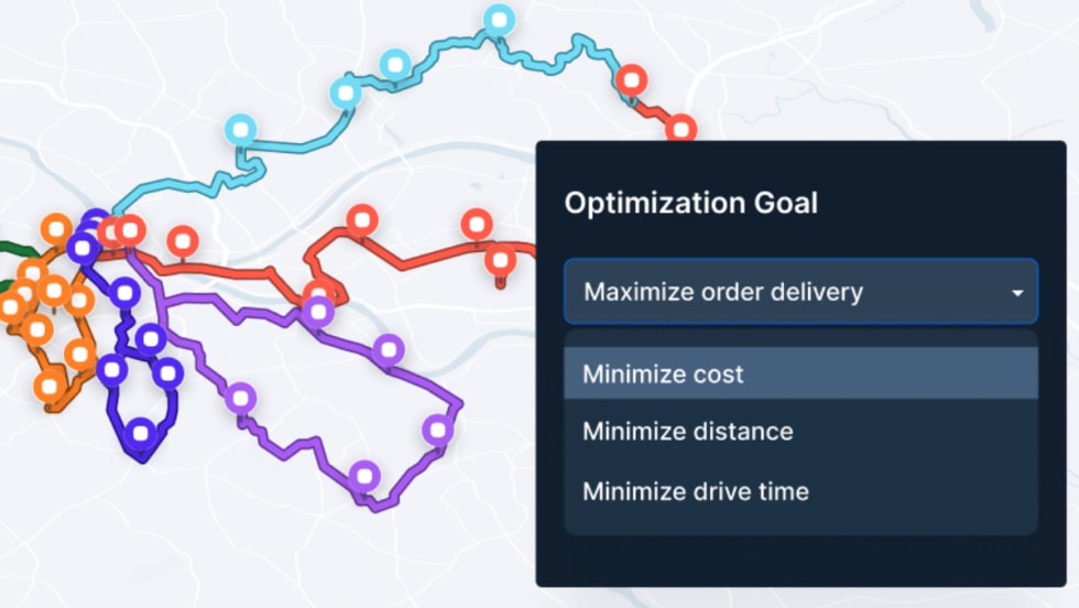 A digital map showing multiple color-coded delivery routes with a pop-up menu titled "Optimization Goal," displaying options to maximize order delivery or minimize cost, distance, or drive time.