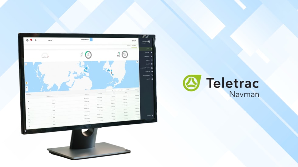 Monitor displaying Teletrac Navman’s TN360 fleet management map and data dashboard on a blue geometric background with the Teletrac Navman logo shown on the right side of the image.