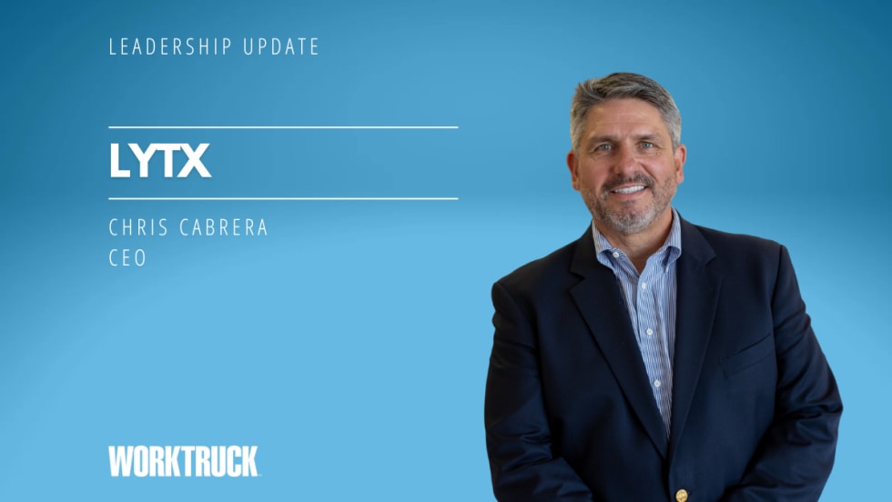 Man in business attire against a blue background and white text with company name, Lytx, and the man's name and title.
