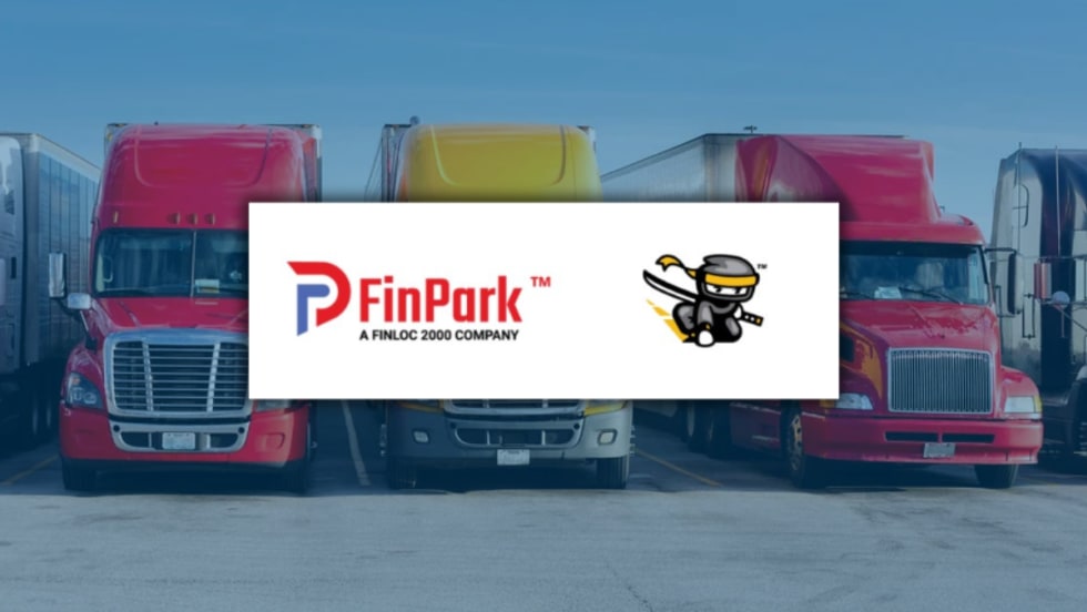 Logos of FinPark and Freight Ninja displayed over a background of parked semi-trucks, representing their partnership to expand secure truck parking solutions nationwide.