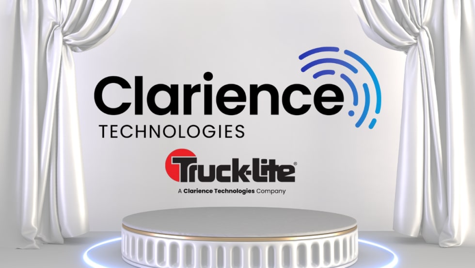 Background image of award-themed background with curtains and inset logos for Clarience Technologies and Truck-Lite.