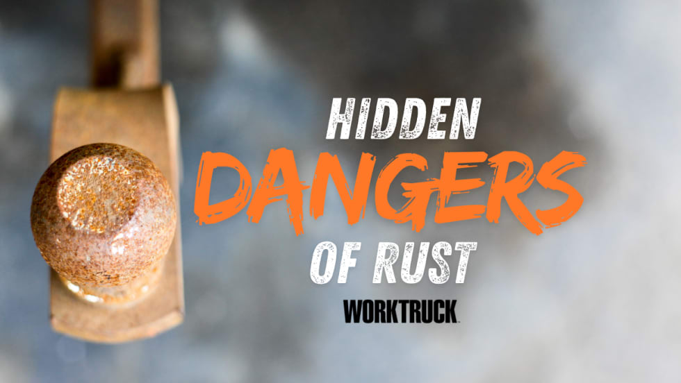 Rusty trailer hitch ball showing corrosion risks and hidden dangers of rust in work truck fleets.