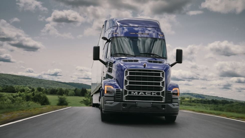 Blue Mack Anthem truck on highway