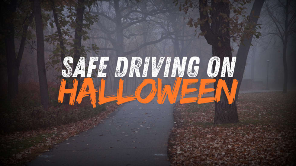 Safe Driving on Halloween over spooky fall road