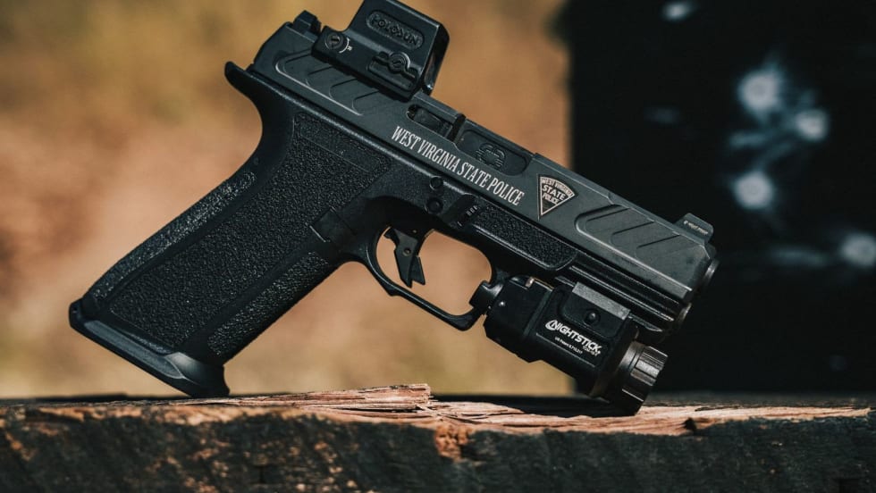 side view of a police handgun with engraving for West Virginia State Police