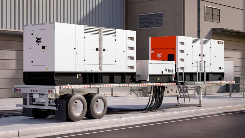 Bobcat PG1140 portable generator on a trailer, featuring dual generator units and heavy-duty power cabling for fleet and worksite power needs.