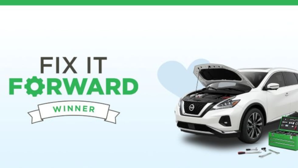 Fix It Forward Giveaway graphic showing a white vehicle with its hood open and tools nearby, representing covered vehicle repairs through DOWC Cares.