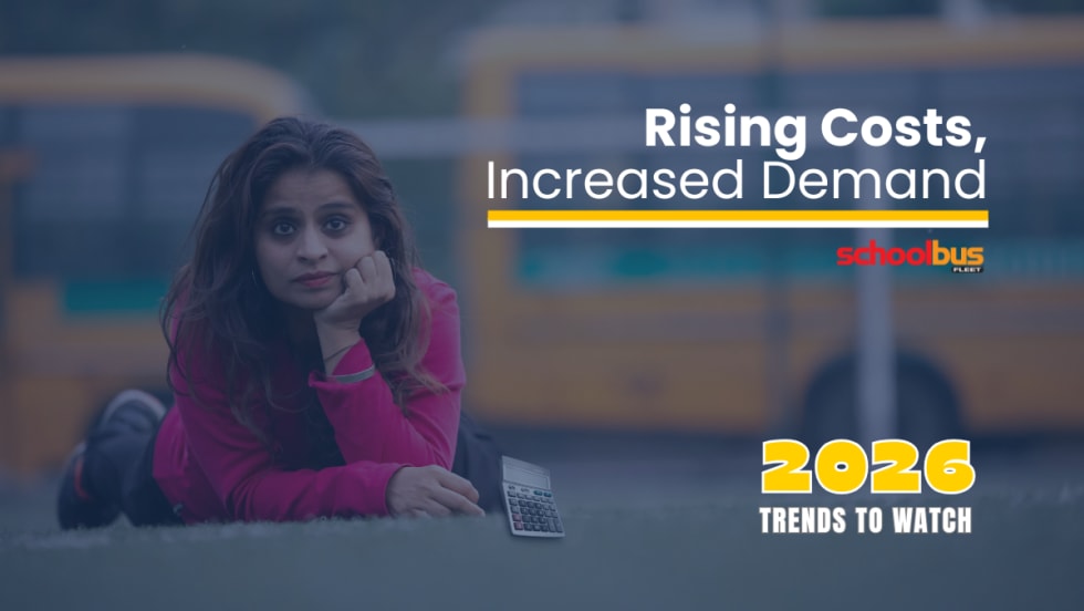Woman lies on the ground holding a calculator with school buses blurred in the background, alongside text reading “Rising Costs, Increased Demand” and “2026 Trends to Watch.”