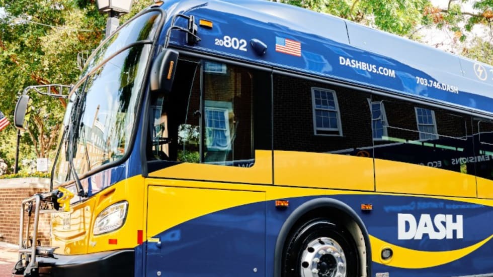 A DASH electric bus parked on a city street in Alexandria, Virginia.