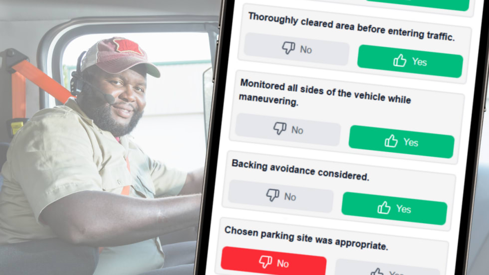 Truck driver behind wheel with superimposed mobile driver assessment from Smith System