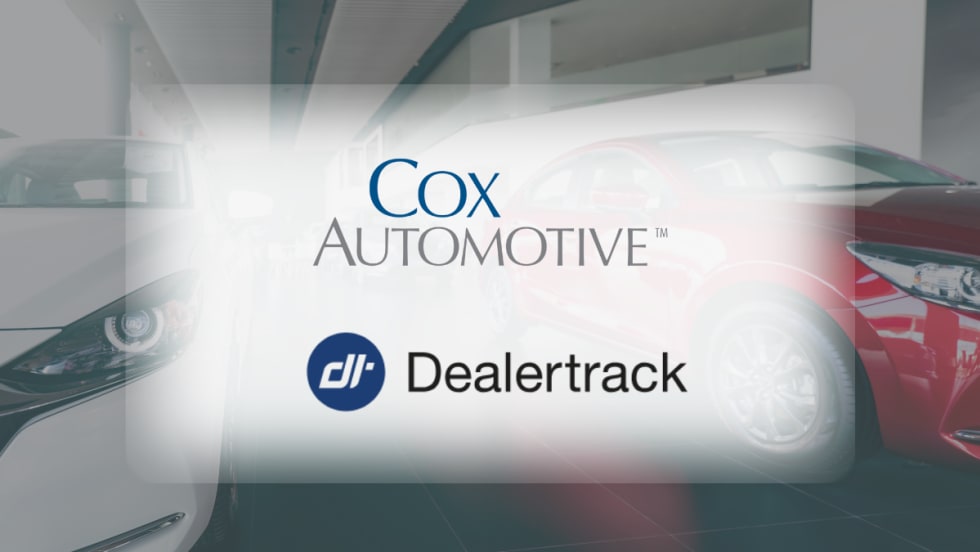 Cox Automotive and Dealertrack logos displayed over a dealership showroom background.