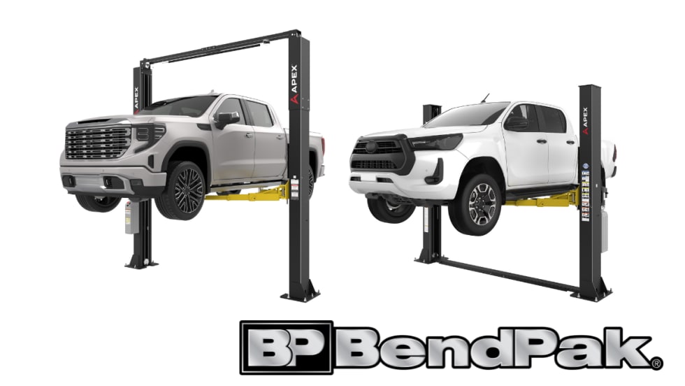 Pickup trucks raised on APEX two-post vehicle lifts inside a studio setting.