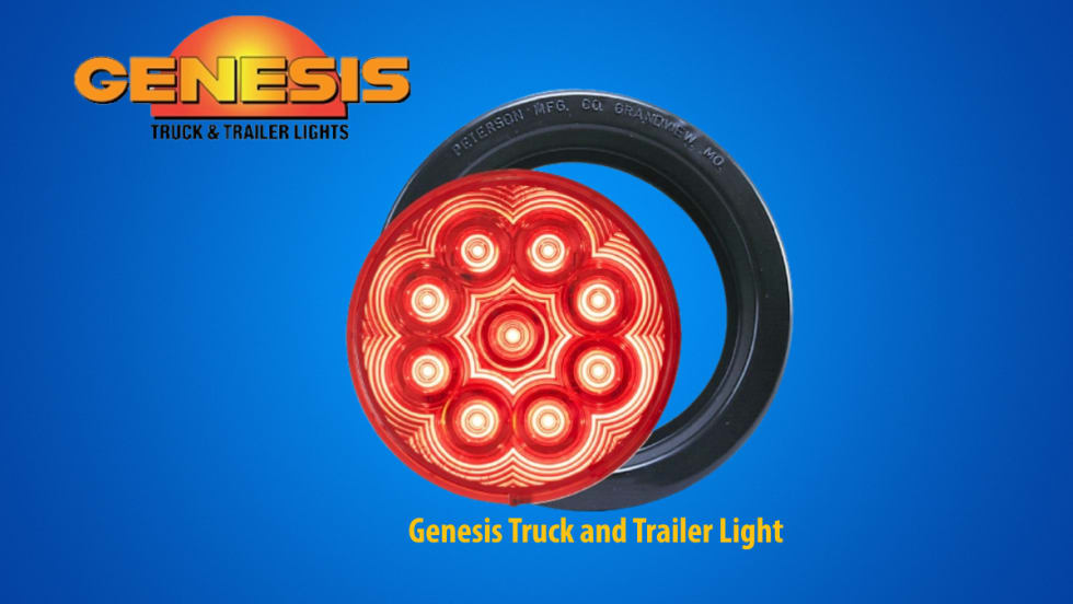 Blue background with a round LED vehicle and trailer light and a logo for Genesis in the upper left.