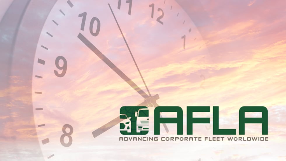 AFLA logo overlaid on clock and sky background, symbolizing the organization’s long-standing impact and evolution in the fleet industry.