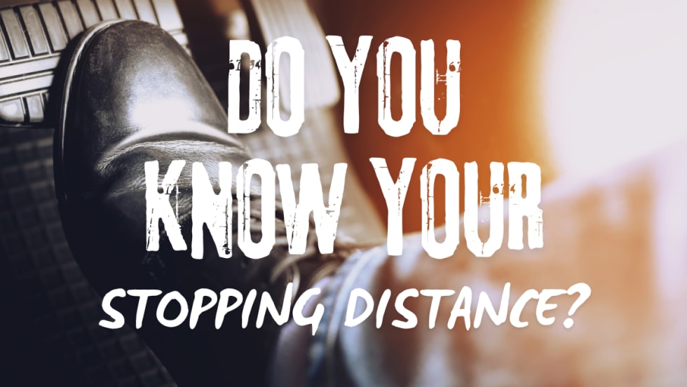 Foot pressing car brake pedal, illustrating driver reaction time and its impact on stopping distance and overall vehicle safety.