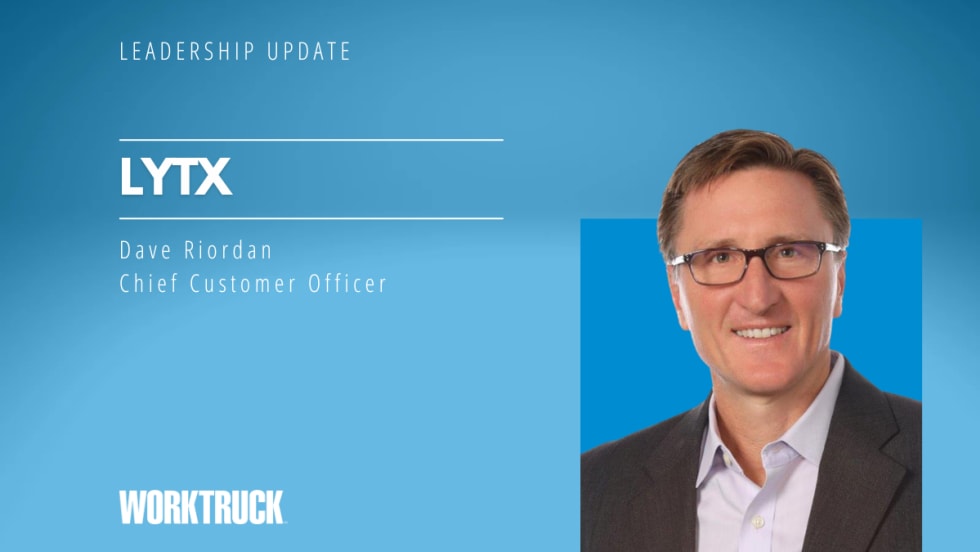 Man in business attire against a blue background and headlines Leadership Update and Lytx, with a logo for Work Truck.