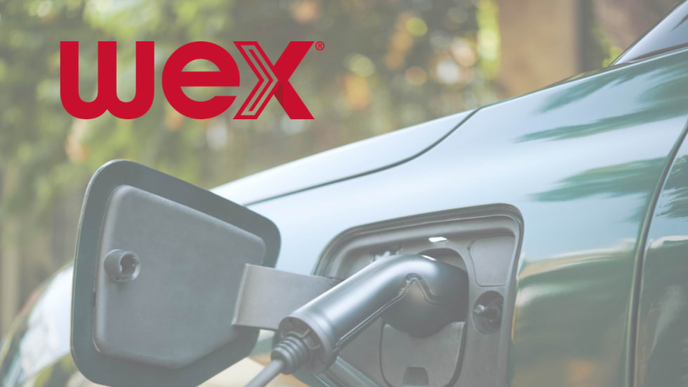 Closeup photo of an EV charger plugged into an EV, with white logo for WEX.