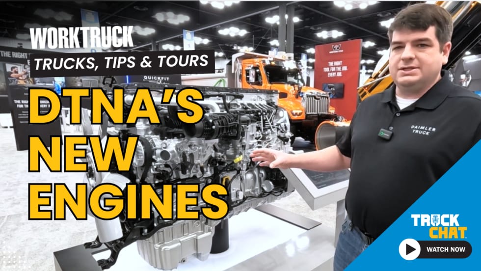Man standing and talking in front of a truck engine, logos for Work Truck and Truck Chat, and yellow headline DTNA's New Engines.