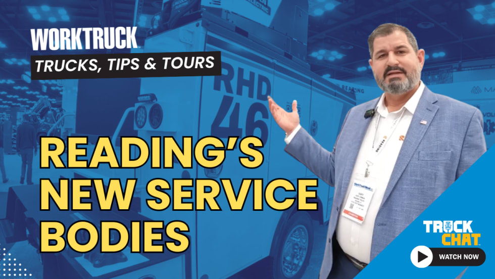 Man in business attire talking and gesturing in front of a truck, tinted blue background, with yellow headline Reading's New Service Bodies, and logos for Truck Chat and Work Truck.