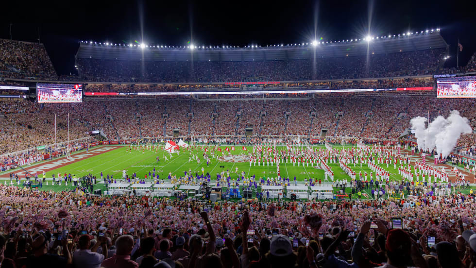 Fans cheer at Saban Field at Bryant-Denny Stadium during a football game at The University of Alabama. 