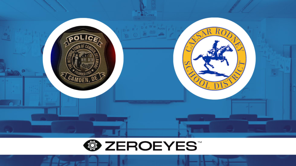 ZeroEyes graphic featuring Camden, Delaware Police and Caesar Rodney School District emblems over a blue-tinted classroom background, with the ZeroEyes logo displayed across the bottom.