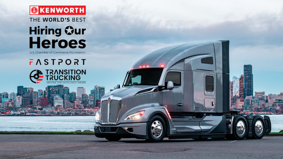 Kenworth T680 semi-truck posed before a city skyline, alongside logos for Kenworth, Hiring Our Heroes, Fastport, and Transition Trucking’s Driving for Excellence Award.