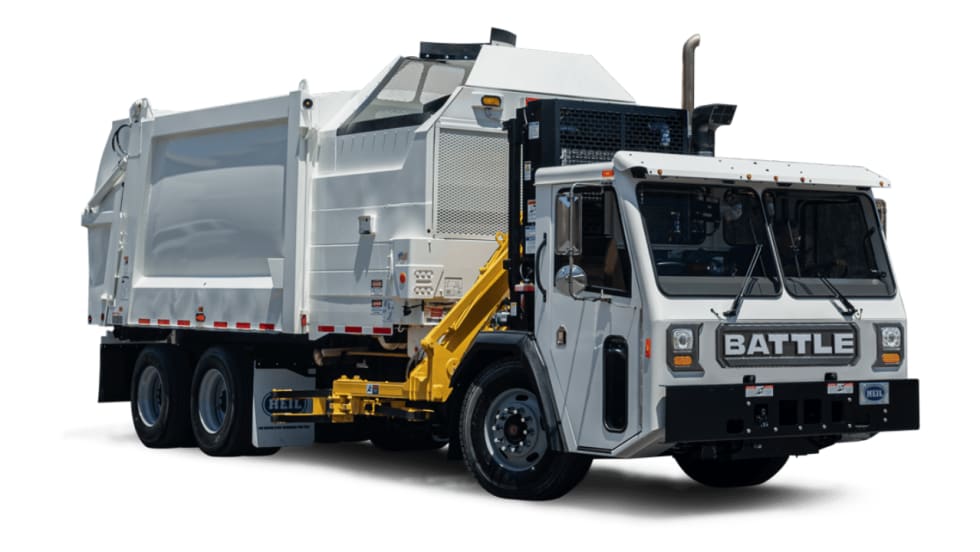 White Battle Motors refuse truck with a Heil side-loading waste collection body and yellow hydraulic lifting arm, shown against a plain white background.