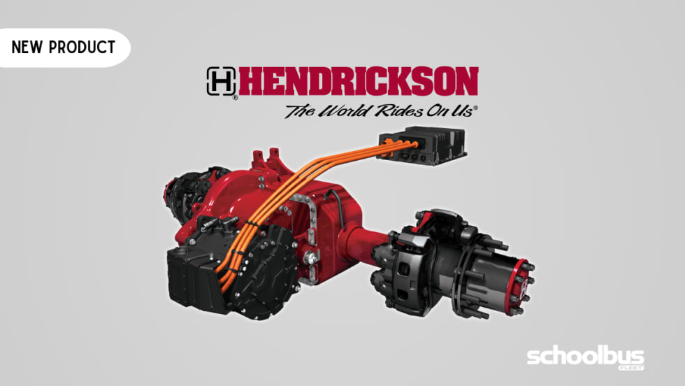 Graphic promoting Hendrickson's new ELECTRAAX electric axle system, featuring a red electric drive axle assembly with high-voltage orange cables connected to a control module. The Hendrickson logo and tagline, "The World Rides On Us," appear above the product against an orange gradient background, with a "New Product" label in the upper left and the School Bus Fleet logo in the lower right.