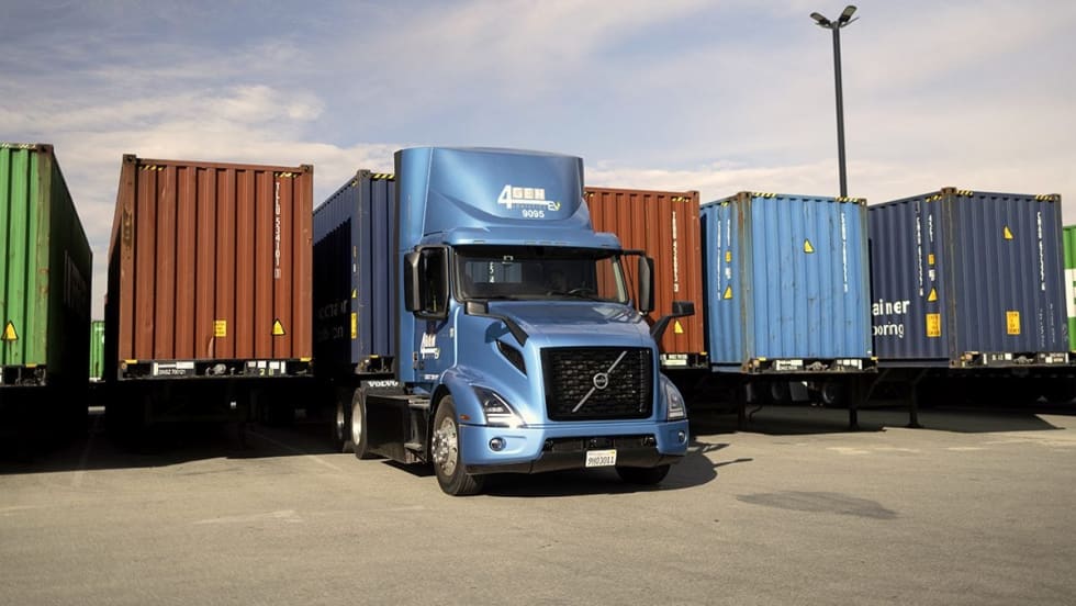 Electric Volvo VNR truck with intermodal containers at port