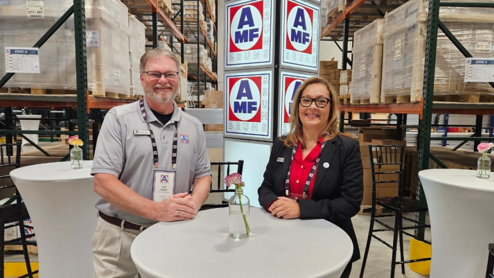 AMF Bruns national account managers Maritza Valentin and Jeff Algire at open house event