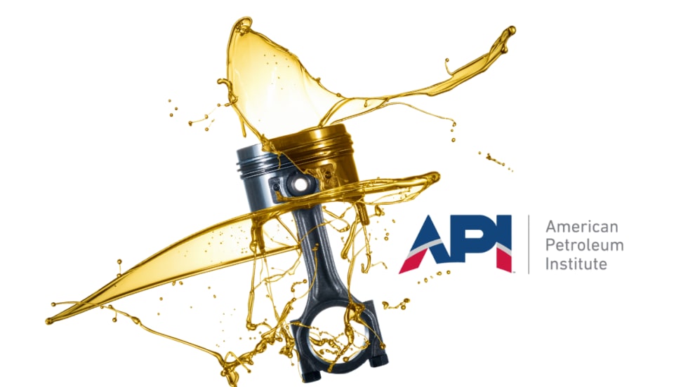 Illustration of a piston with engine oill and API logo