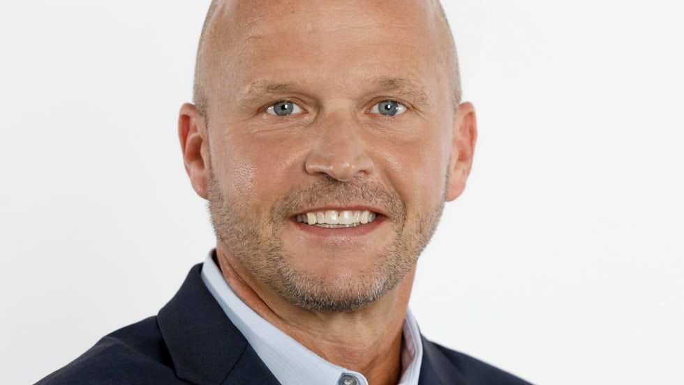 Headshot of Michael Orange