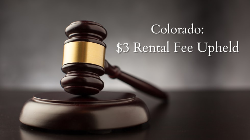 Gavel with text: Colorado: $3 rental fee upheld