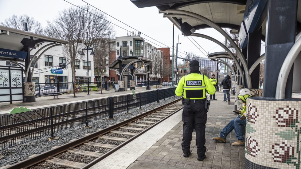 Safety officers at a CATS light rail station