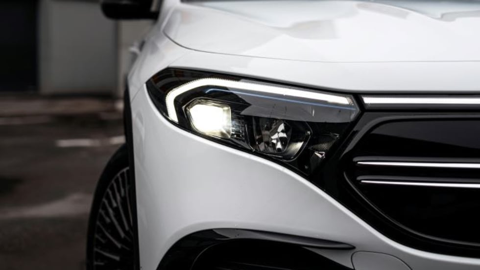 Closeup photo of the front of a white car