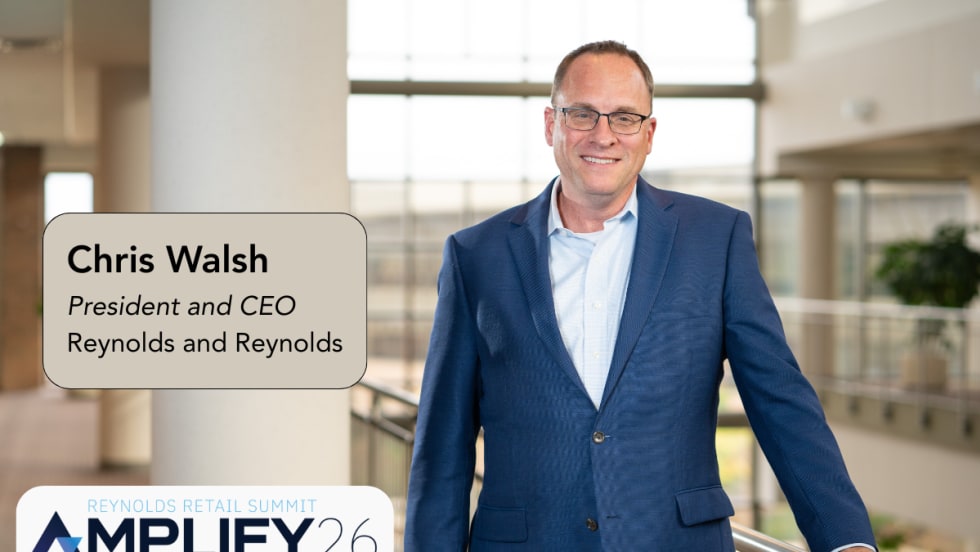 Photo of executive in a sports coat and glasses