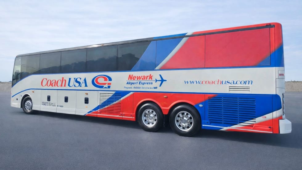 A Coach USA vehicle wrapped for Newark International Airport service.