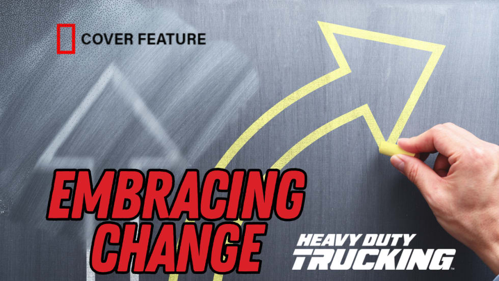 Illustration of a chalkboard with a hand drawing an arrow curving away from a partially erased straight arrow with the words "Embracing Change," the Heavy Duty Trucking Logo and the "cover feature" graphic.