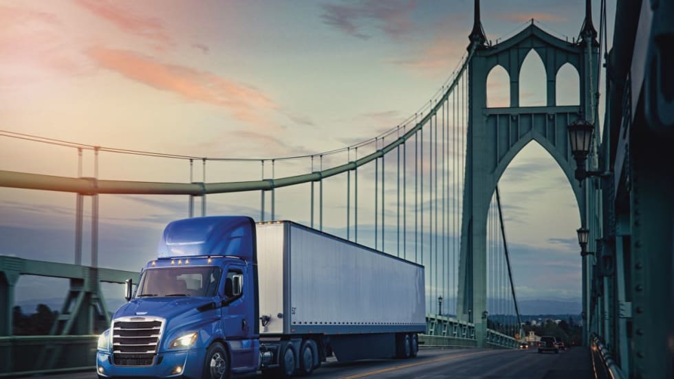 Illustration of day cab tractor-trailer crossing bridge