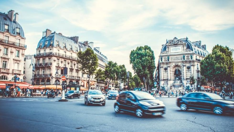 Cars on road in European city