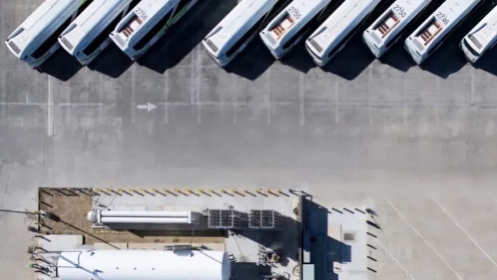 A drone shot of vehicles parked. 